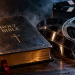 Holy Bible beside a film reel and filmstrip, illustrating comparisons between scripture and horror films.